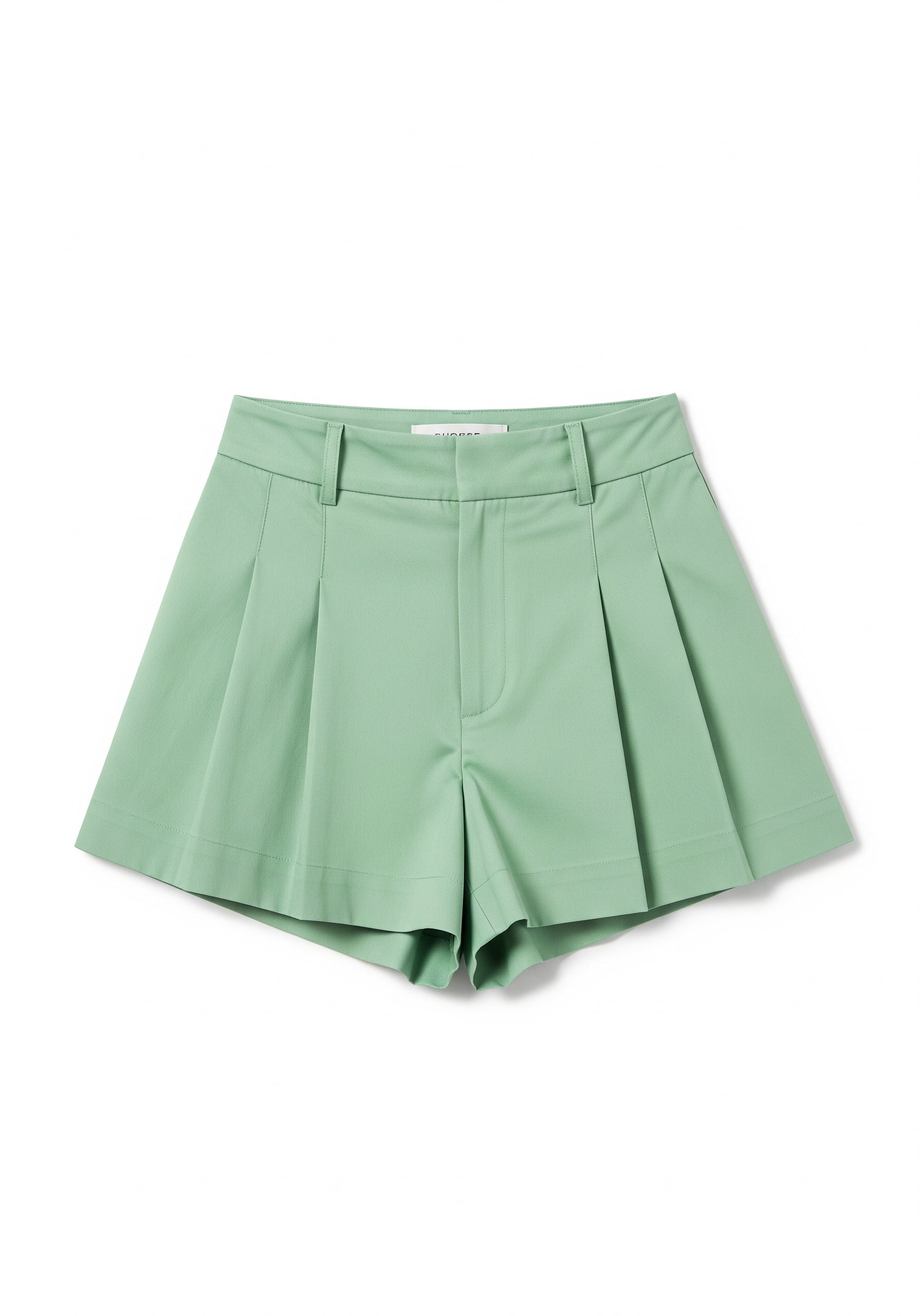 Green pleated shorts on a white background